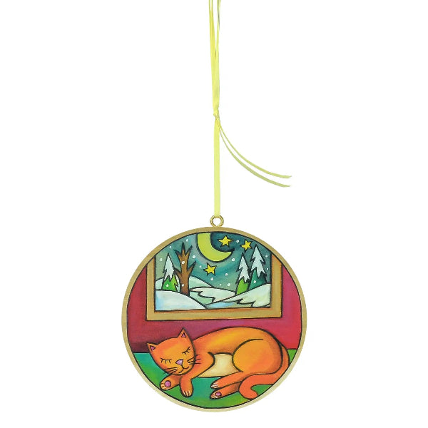 Decorative ornament with a sleeping fox and winter scene on a white background