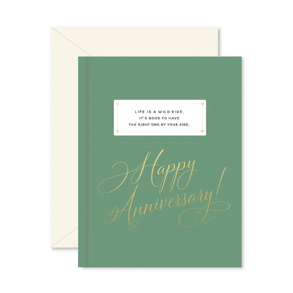 Green anniversary card with gold text and white envelope on a white background