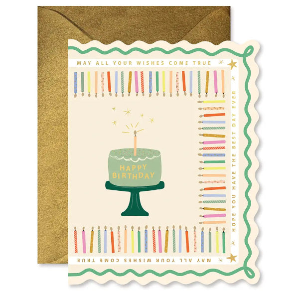 Birthday card with cake illustration and colorful candles on a gold envelope.