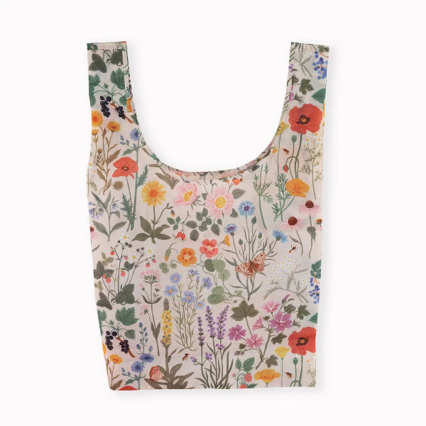 Reusable shopping bag with floral pattern on a white background