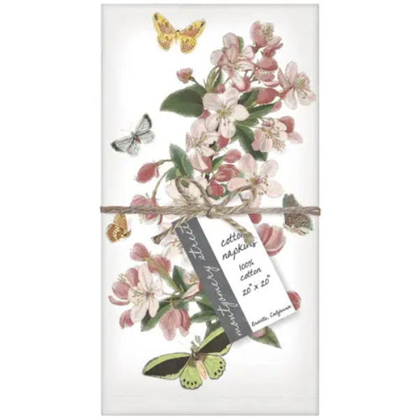 Pack of cotton napkins with floral design and butterflies on a white background