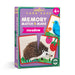The packaging box for the 'meadow' Memory Match & Make card game by eebo. The box features a purple background with colorful illustrations of a hedgehog, a bluebird, strawberries, and flowers, along with a green 'Always Good for Families' seal.