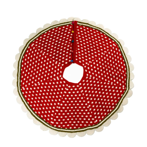 Red and white patterned tree skirt on a white background