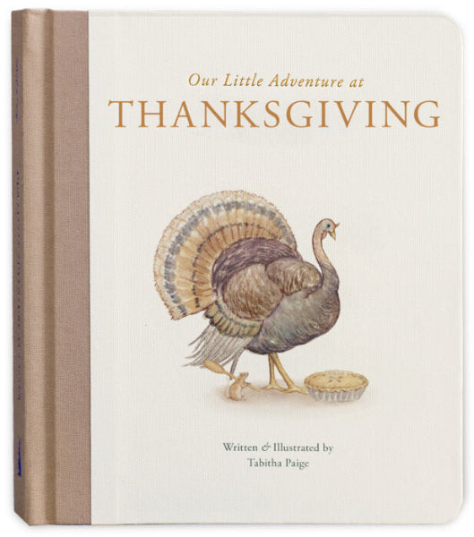 Book titled 'Our Little Adventure at Thanksgiving' with a turkey illustration on the cover.