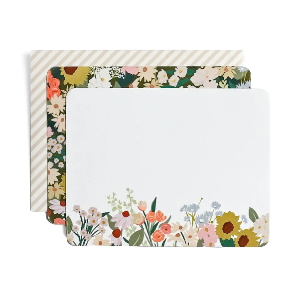 Three rectangular writing notes stacked slightly offset, featuring a white center with a floral border and a striped outer pad on a white background.