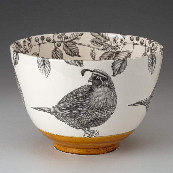 Ceramic bowl with a bird design on a white background