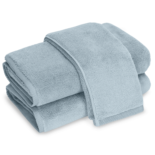 Stack of light blue towels on a transparent background