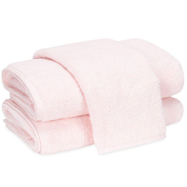 Folded pink towel on a transparent background