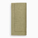 Green napkin with hemstitching on a white background