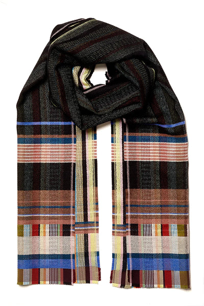 A multicolor striped and plaid scarf with black, brown, blue, red, and beige stripes, draped on a plain white background.