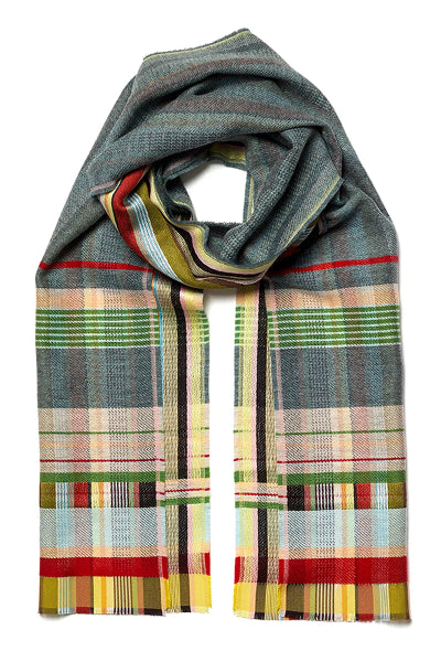 A multicolor plaid scarf with a gray-green base and stripes of red, yellow, green, beige, and black, shown on a plain white background.
