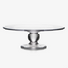 Clear glass cake stand on a white background