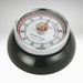 Black kitchen timer with a silver rim and red markings on a white background