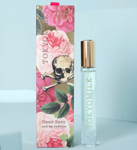 TOKYOMILK Dead Sexy Eau de Parfum with floral packaging on a light blue background