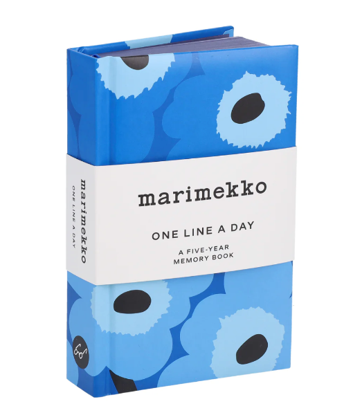 Marimekko 'One Line a Day' memory book with blue floral design on a white background