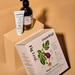 Osmology Fig Leaf hand therapy set on a beige background