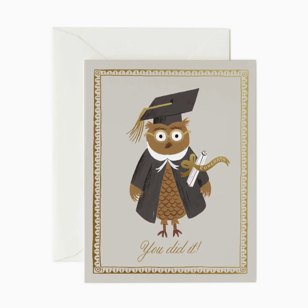 Graduation-themed card with an owl wearing a cap and holding a diploma, on a white background.