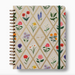 Notebook with floral pattern and gold accents on a white background