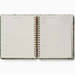 Open planner with floral design on a white background
