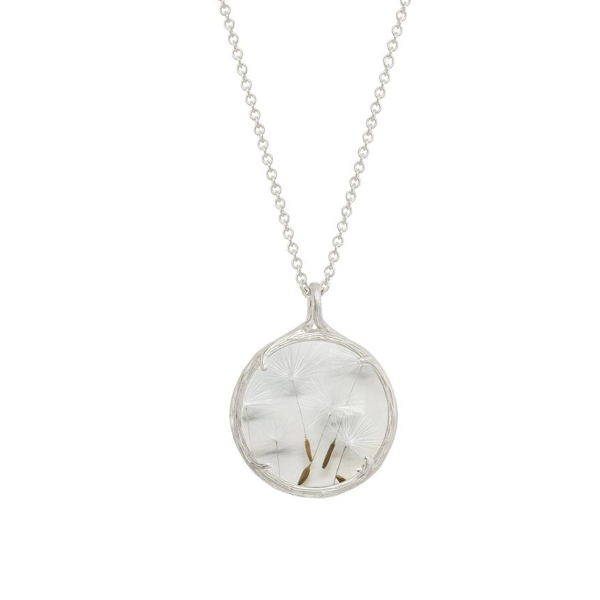A silver chain necklace with a round pendant containing preserved dandelion seeds and petals under clear resin, shown on a plain white background.