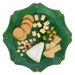 A green scalloped ceramic plate with decorative raised edges, filled with an appetizer spread including crackers, cubed cheese, a wedge of soft cheese, sliced crackers, peanuts, and green olives, isolated on a white background.