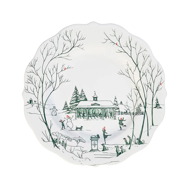 Decorative plate with winter scene design featuring trees, a gazebo, and people in a snowy landscape.
