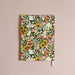 Floral notebook on a beige background