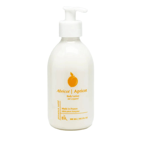 A white pump bottle of Apricot Body Lotion with a yellow-orange apricot graphic and text on the front, set against a plain white background.