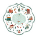 A circular winter village illustration with a scalloped green border and bow, featuring a frozen pond with skiers and ice dancers, houses, trees, a Christmas tree, sleighs, and small holiday figures on a white background.