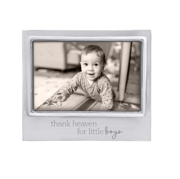 Silver photo frame with a baby picture and 'thank heaven for little boys' text on a white background