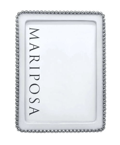 Mariposa picture frame with decorative border on a white background