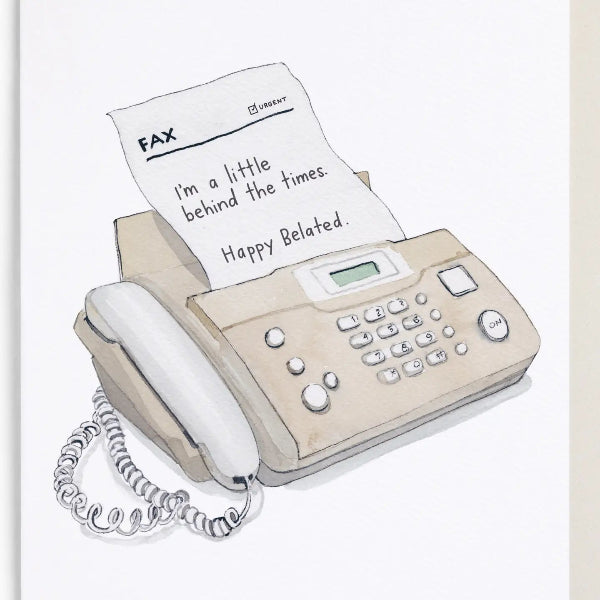 Fax machine with a paper on top displaying a humorous message.