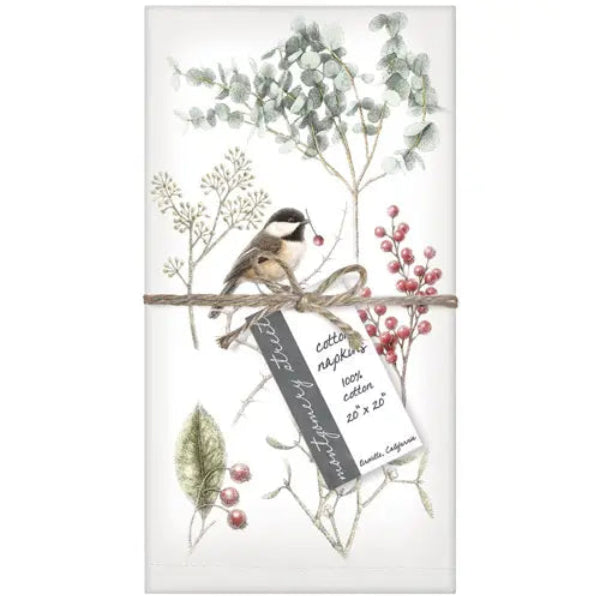 Packaging of cotton napkins with a bird and foliage design on a white background
