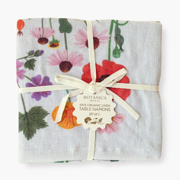 Set of floral table napkins with a Botanica label on a white background