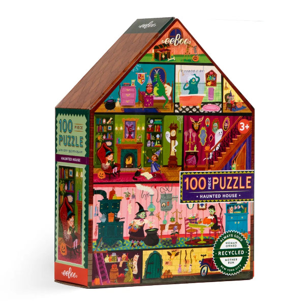 A 100-piece jigsaw puzzle box shaped like a haunted house, featuring a colorful collage of spooky illustrations including a witch, ghosts, pumpkins, and a fireplace. The brand name 'eeloo' is visible on the top and bottom corners of the box.