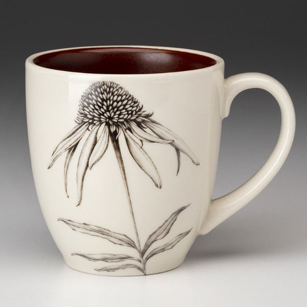 Ceramic mug with floral design on a gradient background