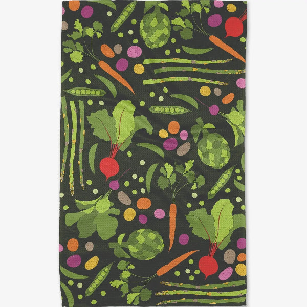 Patterned towel with colorful vegetables on a black background