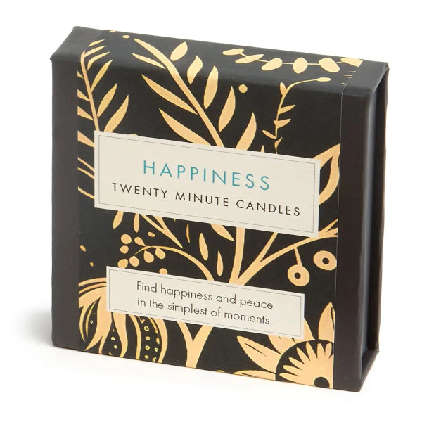 Box of 'Happiness Twenty Minute Candles' with gold leaf design on a white background