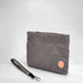 Gray quilted pouch with a strap on a white background