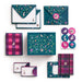 Collection of stationery items with floral and plaid designs on a white background