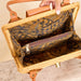  Basket handbag with patterned interior on a wooden surface