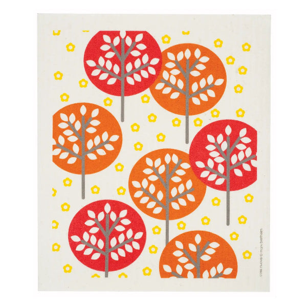 A swedish dishcloth featuring a repeating pattern of stylized trees inside red and orange circles on a cream background, with small yellow flower-like accents. The design is centered and clean, with a thin dark border around the square artwork.