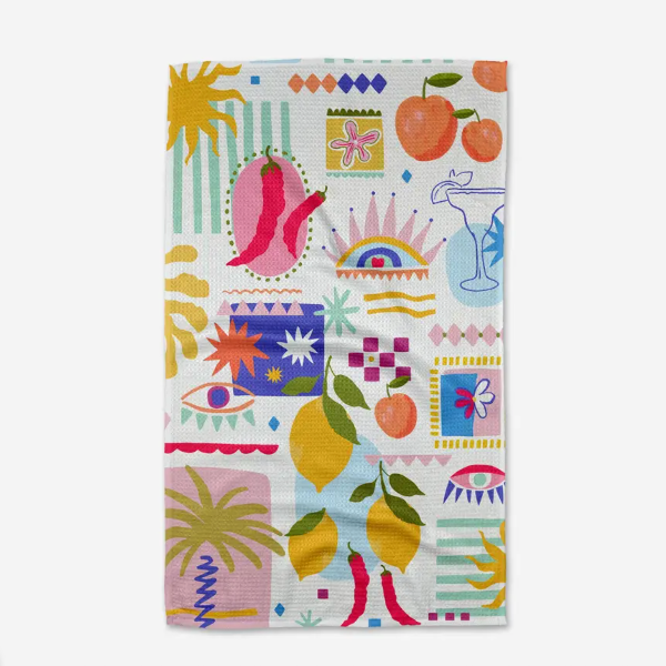 Colorful patterned towel with various designs on a white background