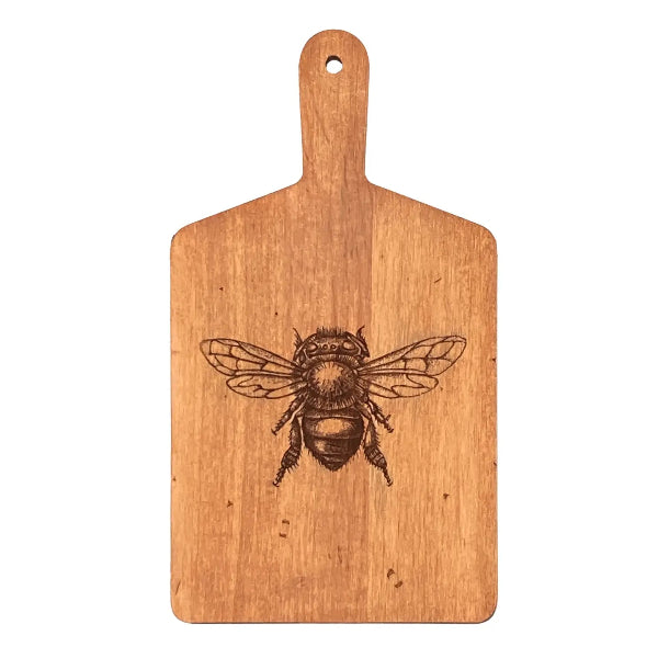 Wooden cutting board with a engraved bee design on a white background