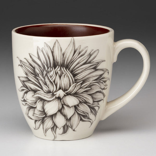 Ceramic mug with a floral design on a gradient background