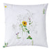 Decorative pillow with floral patterns on a white background