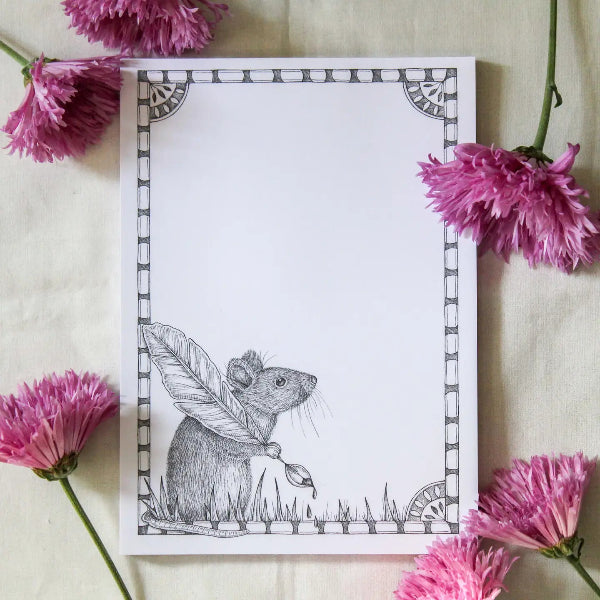 A square art print featuring a detailed black and white sketch of a fairy mouse holding a leaf and acorn, surrounded by pink flowers on a cream fabric background.