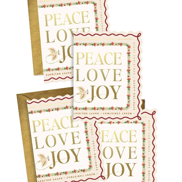 Three matching greeting cards with gold foil 'PEACE LOVE JOY' text and a scalloped floral border, shown with gold envelopes on a white background.