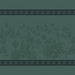 A repeating fabric or wallpaper pattern in muted teal-green, featuring a central winter village scene with trees, cabins, and small animals, framed by decorative borders at the top and bottom.