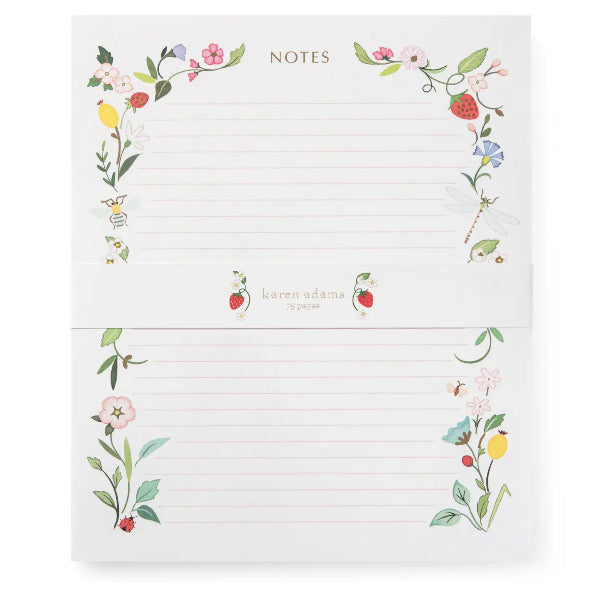Notebook with floral designs and 'Karen Adams' branding on a white background